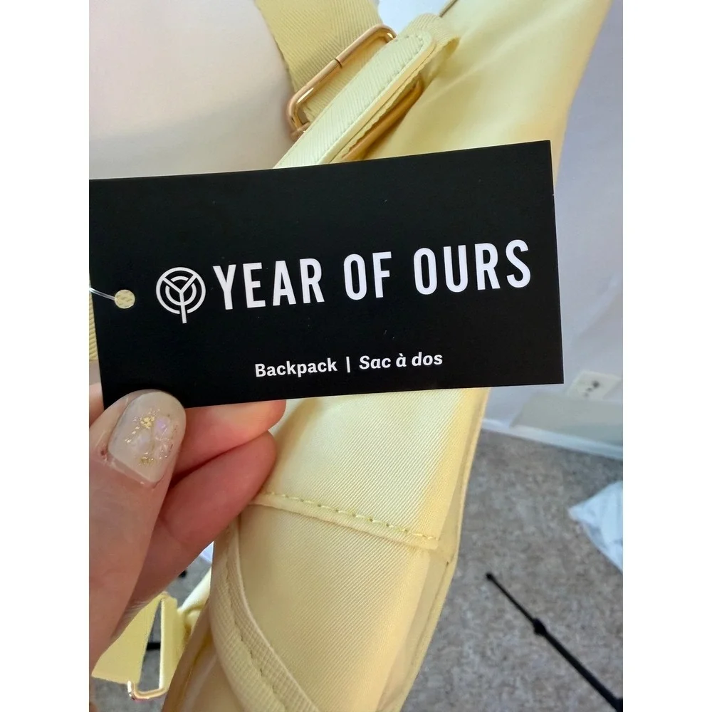 Year of Ours Nylon Backpack Pale Yellow Drawstring Buckle Flap OS NWT